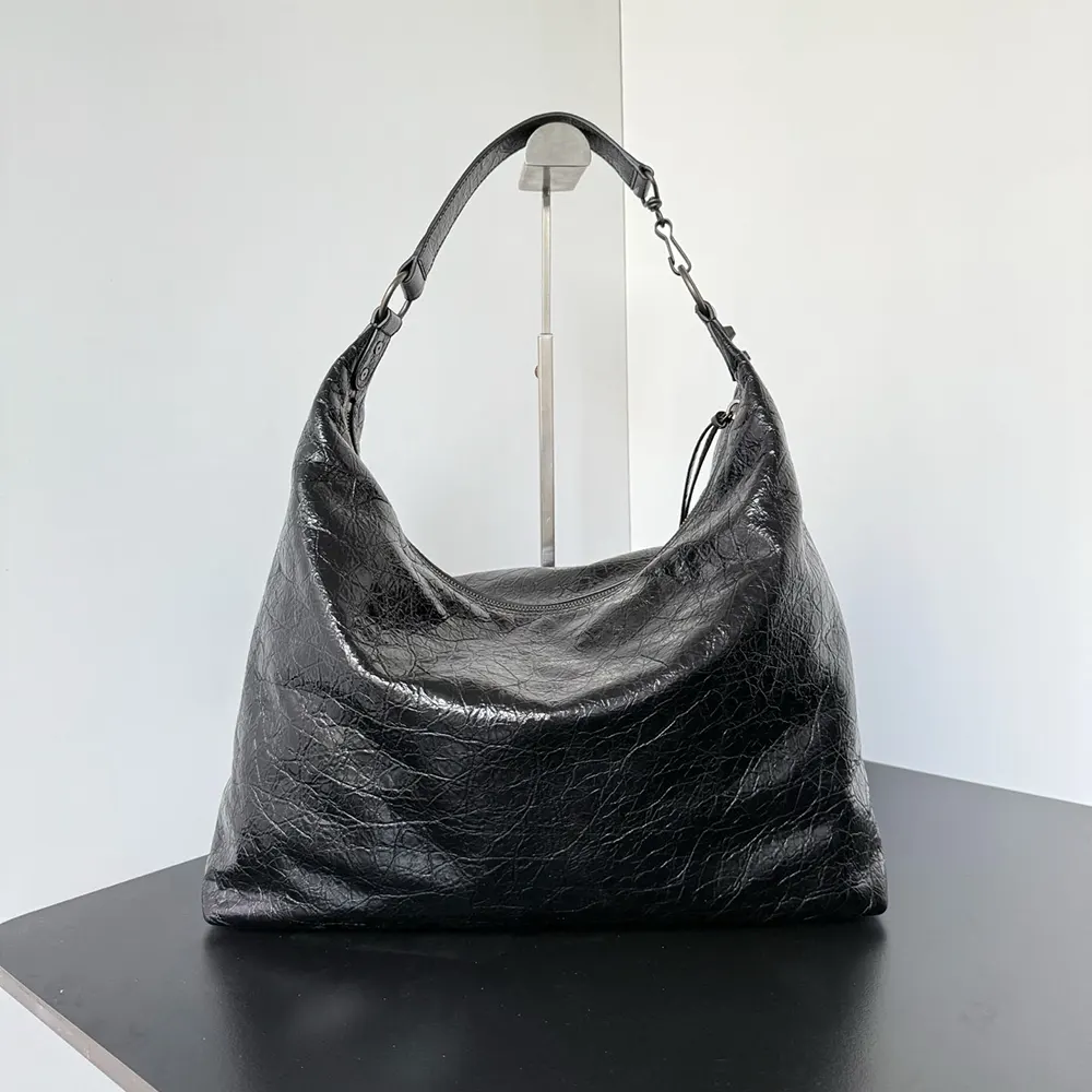 Side angle showing silhouette of Balenciaga Women Le City Hobo Bag Medium