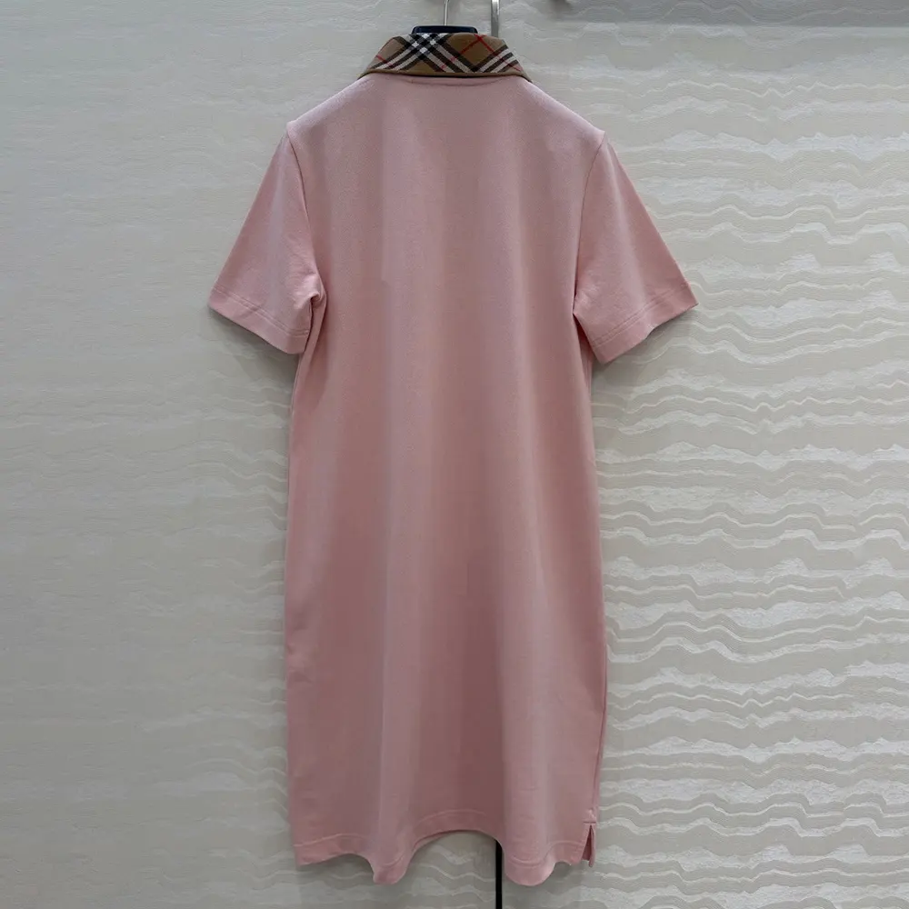 Side angle showing silhouette of Burberry Women Check Collar Cotton Polo Shirt Dress-Pink