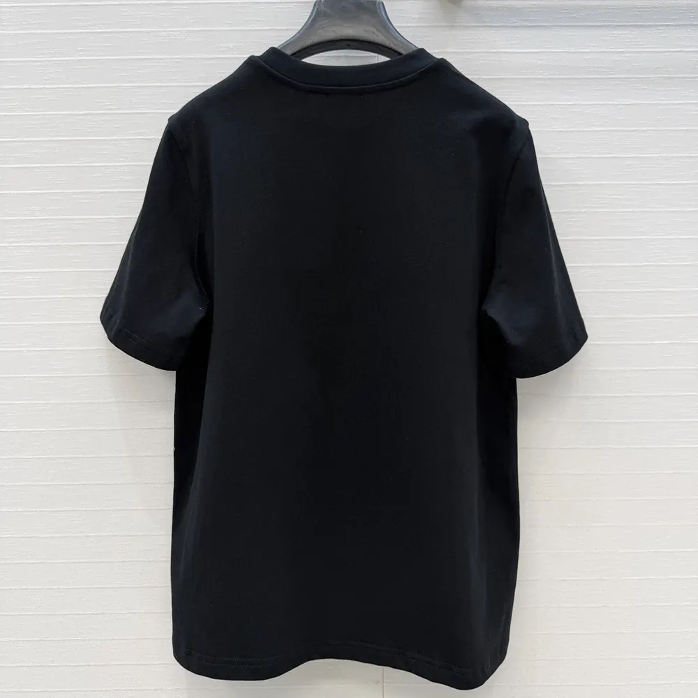 Side angle of Burberry Women Crystal EKD Cotton T-shirt-Black highlighting fabric texture