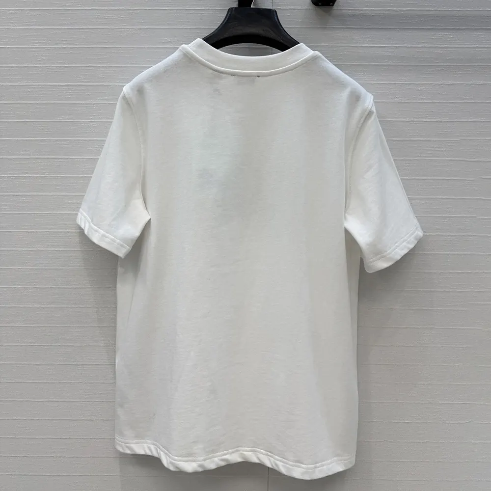 Side profile showing fit of Burberry Women Crystal EKD Cotton T-shirt-White
