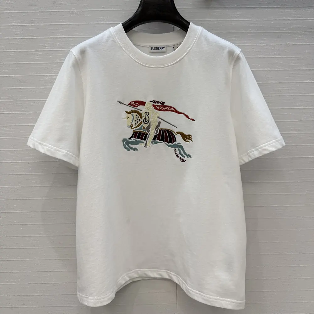 Close-up of crystal-embellished EKD logo on Burberry women’s T-shirt