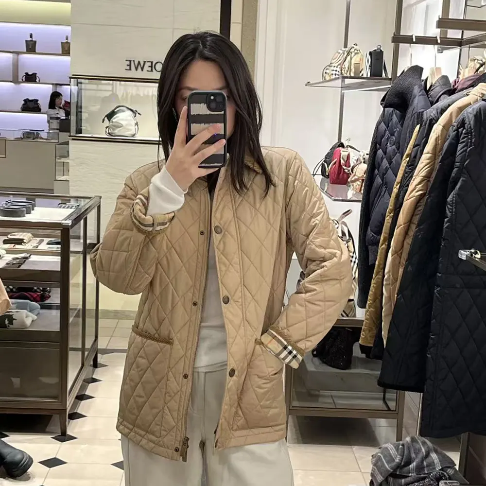 Side profile showing silhouette and zipper of Burberry Women Quilted Nylon Barn Jacket