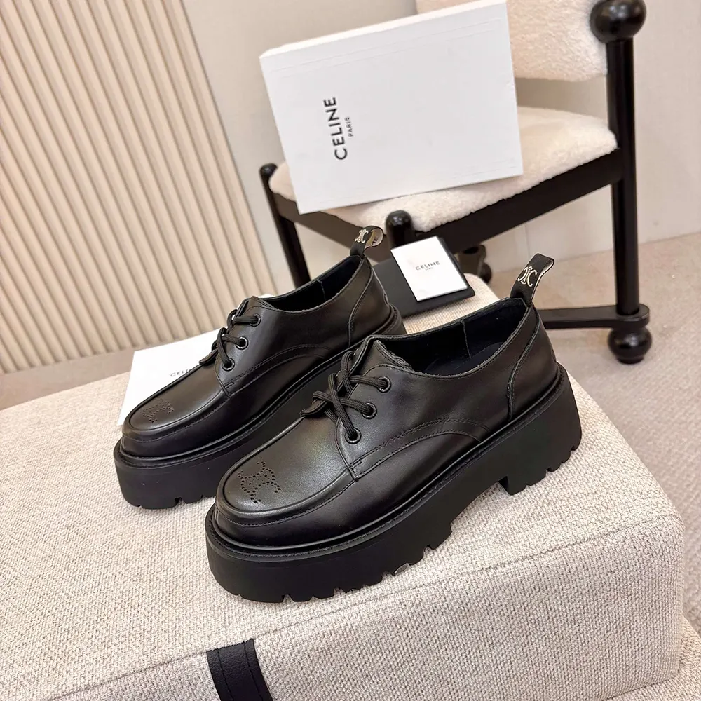 Overhead view showing laces and shiny bull leather texture on Celine Women Triomphe Derbies