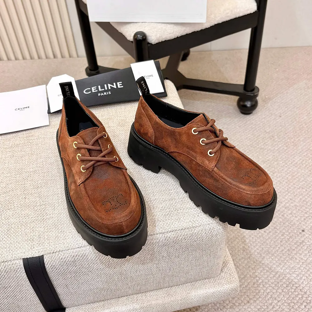 Top-down shot of lace-up detail on Celine Women Triomphe Derbies brown suede