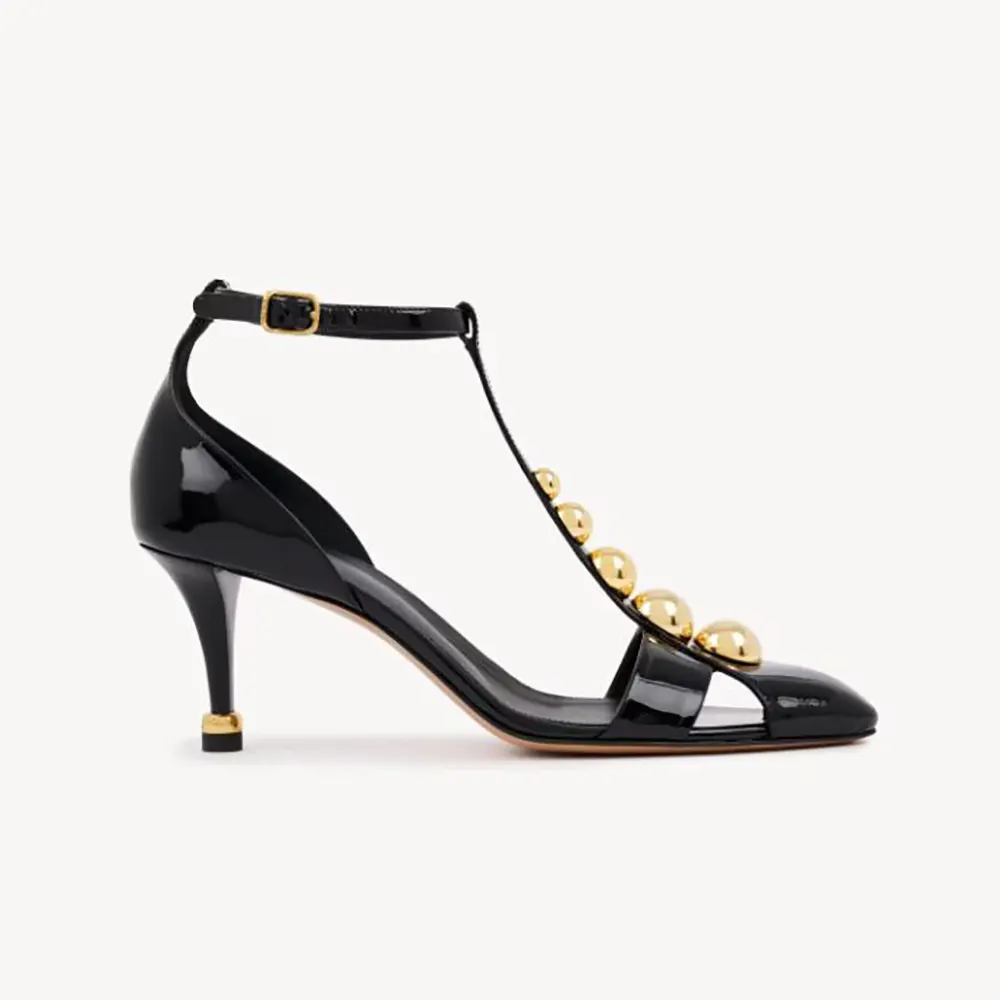Side view of Chloe Women Cleia Heeled Sandal-Black showing block heel