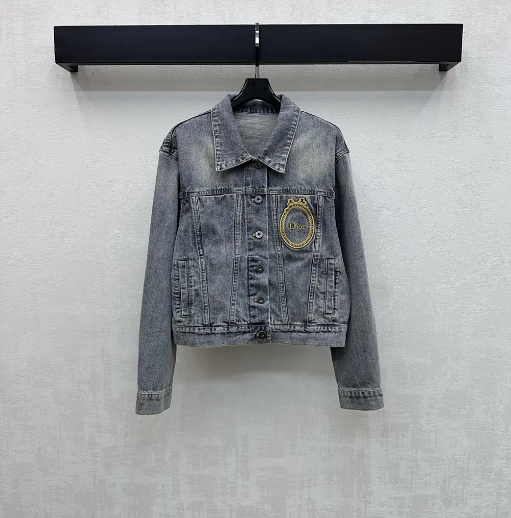 Close-up of medallion hardware on Dior Women Médaillon Cropped Jacket