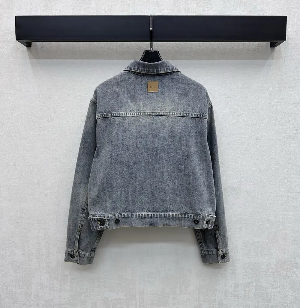 Side angle showing silhouette of Dior Women Médaillon Cropped Jacket Blue Stonewashed Cotton Denim