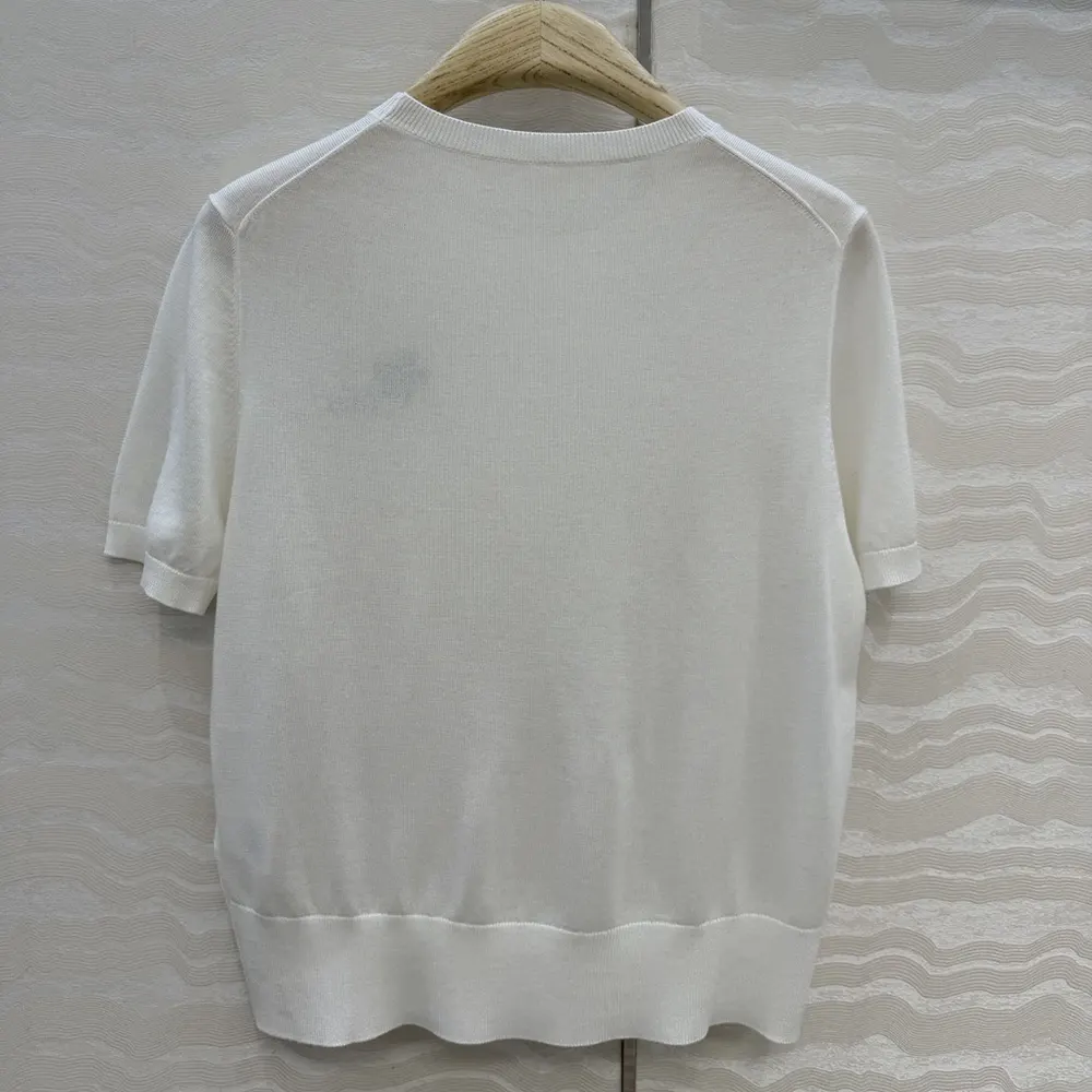 Side profile showing fitted silhouette of Dior Women Short-Sleeved Sweater
