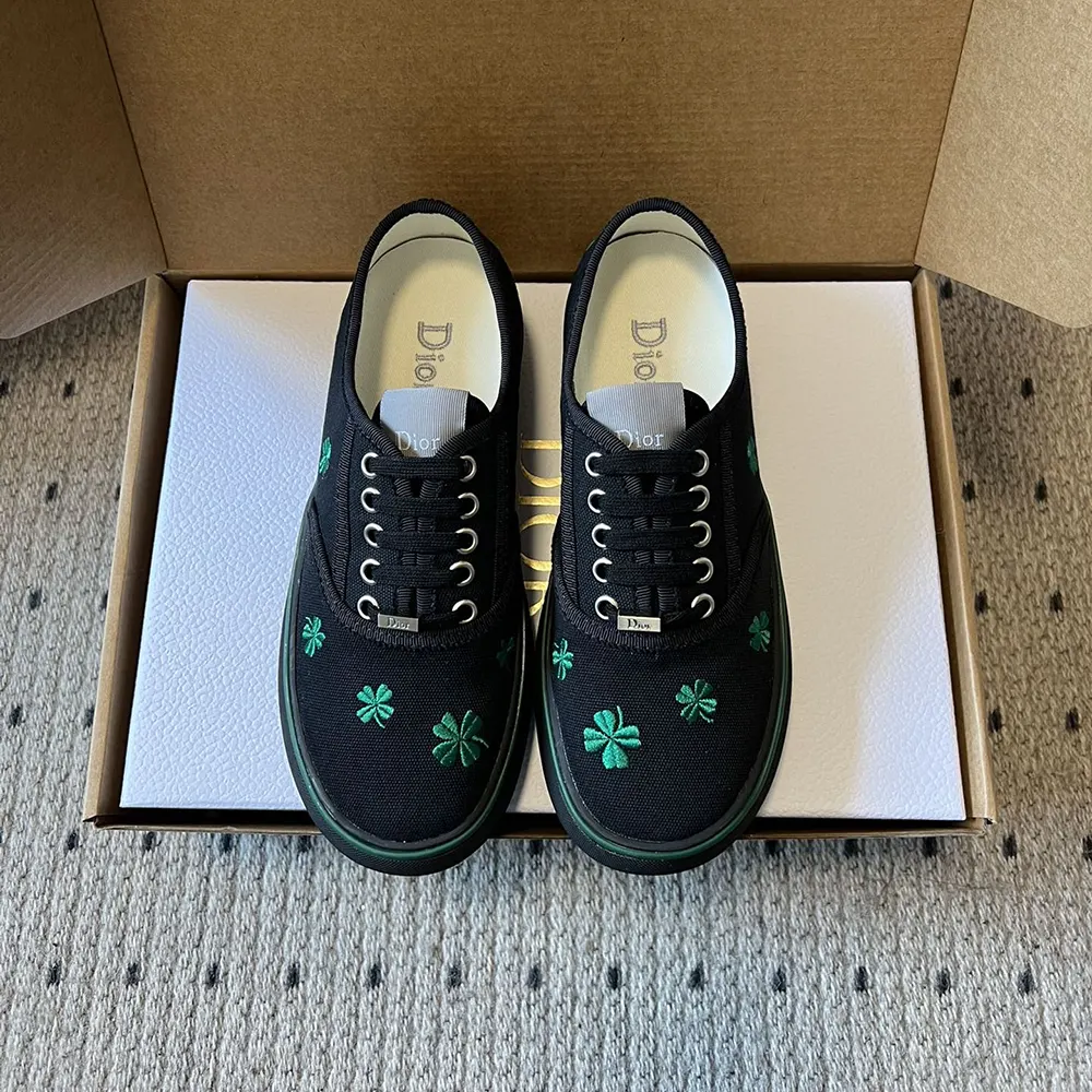 Top-down view highlighting lace-up and cotton material of Dior Saltwind Sneaker