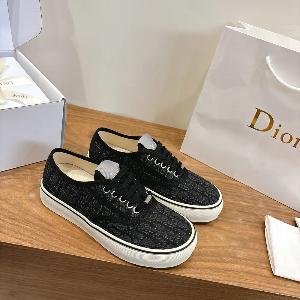 Top-down view showing laces and signature Dior hardware on sneaker
