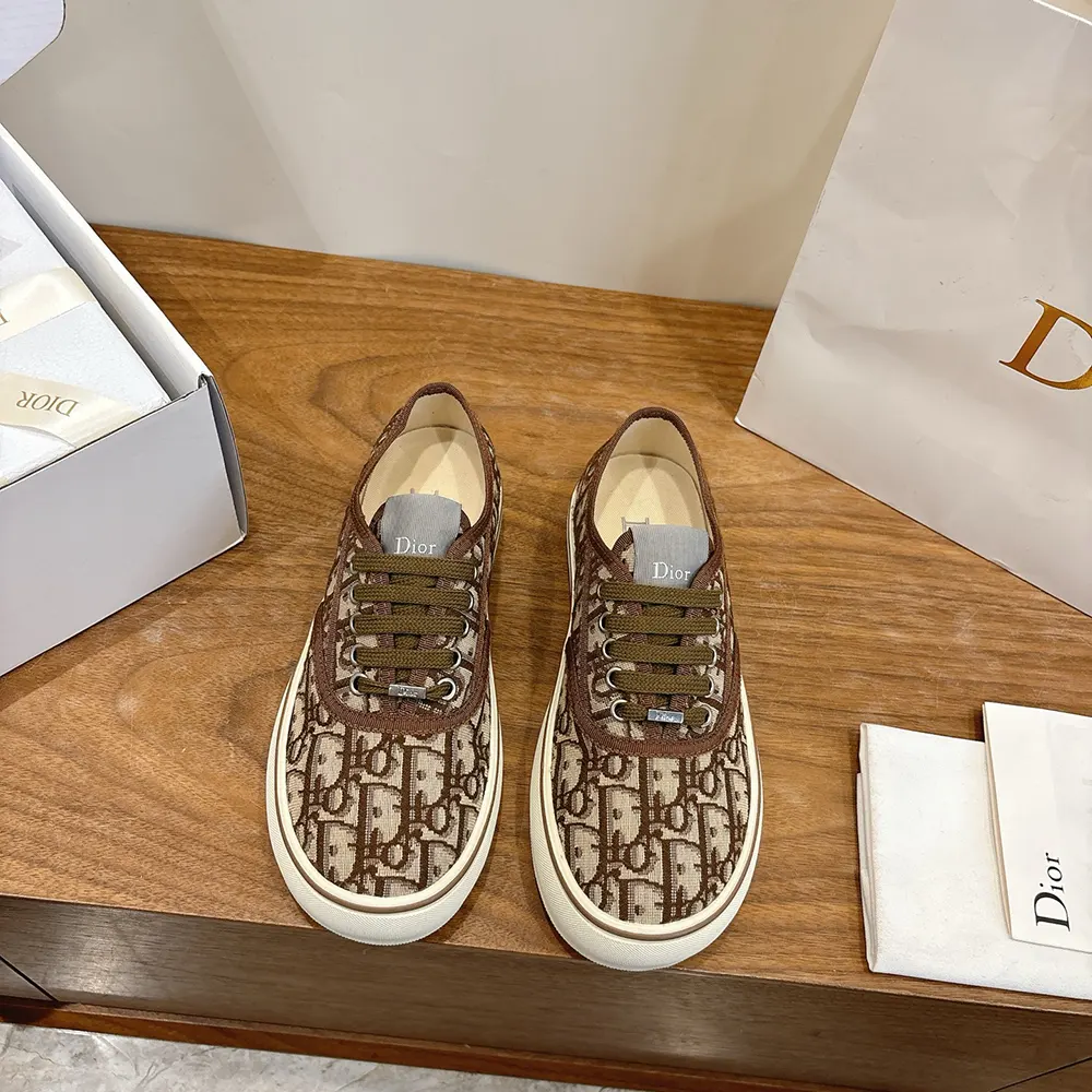 Close-up on lace-up closure and Dior jacquard pattern detail