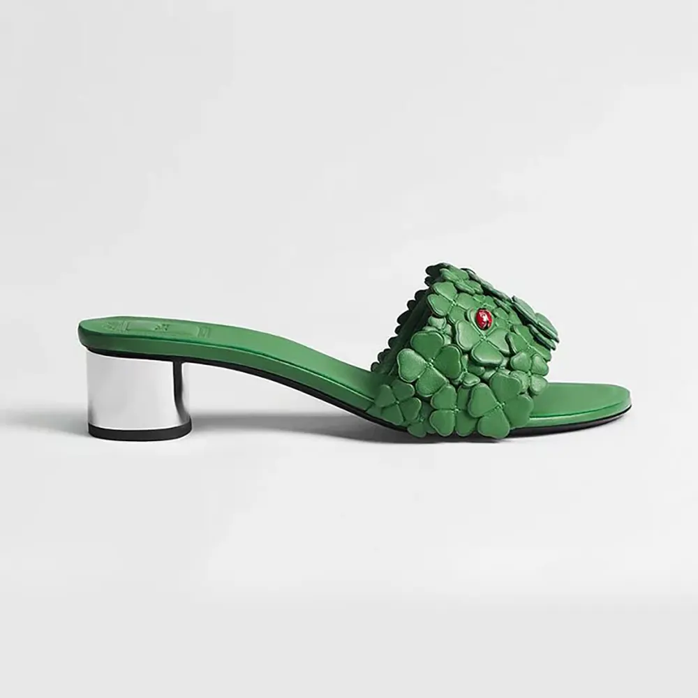 Side view of Dior Women Bloom Heeled Slide Green Dior Clover Embroidered Lambskin