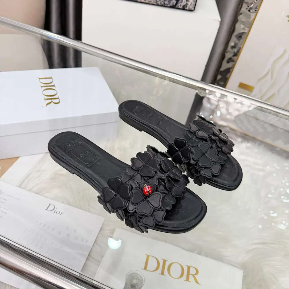 Close-up of Dior Clover embroidery on Dior Women Bloom Slide