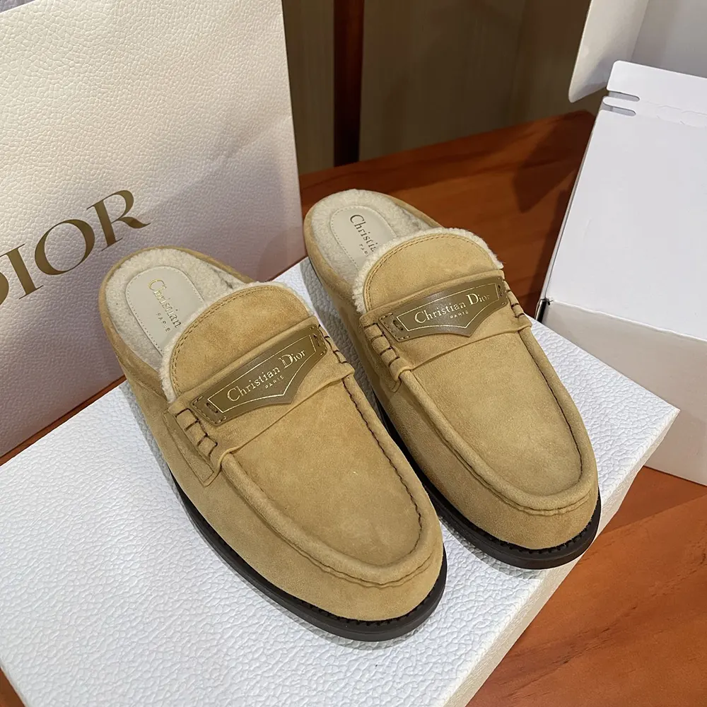 Close-up of gold-tone ‘CD’ hardware on Dior Women Boy Mule Beige Suede Goatskin
