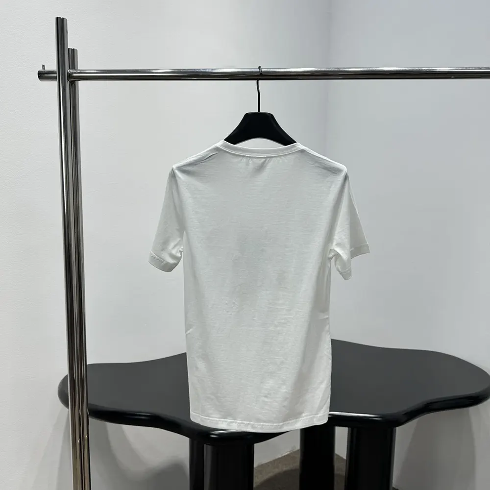 Side angle showing fitted silhouette of Dior Women White Cotton T-Shirt