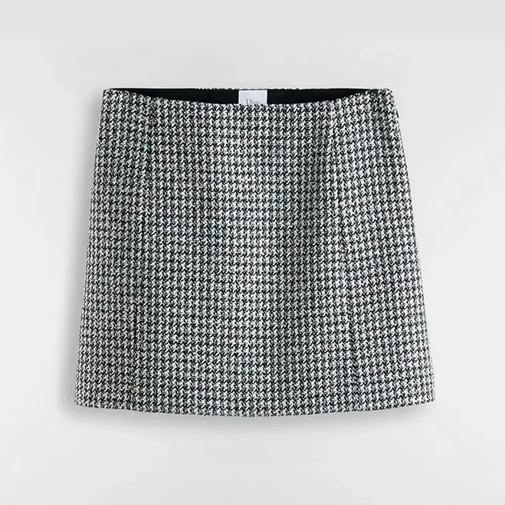 Front view of Dior Women Flared Miniskirt with black and white houndstooth