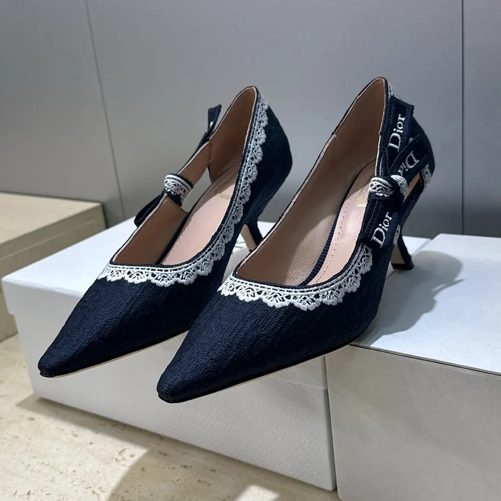 Top view of Dior Women J’Adior Pump showcasing white lace overlay and heel