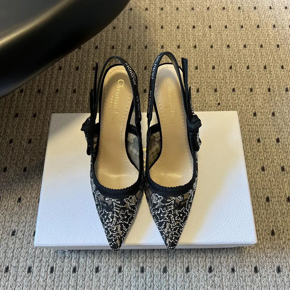 Back angle showing black leather slingback strap on Dior J’Adior pump