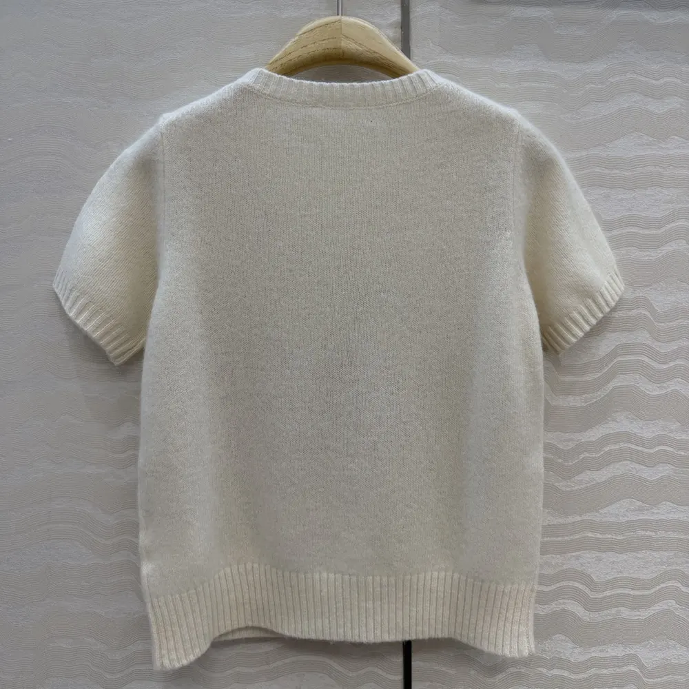 Side angle showcasing fit and texture of Dior Women Short-Sleeved Sweater