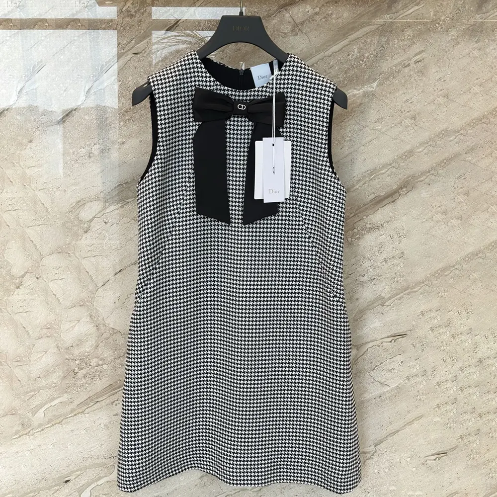 Side angle showcasing silhouette of Dior Women Straight-Cut Short Dress in black and white