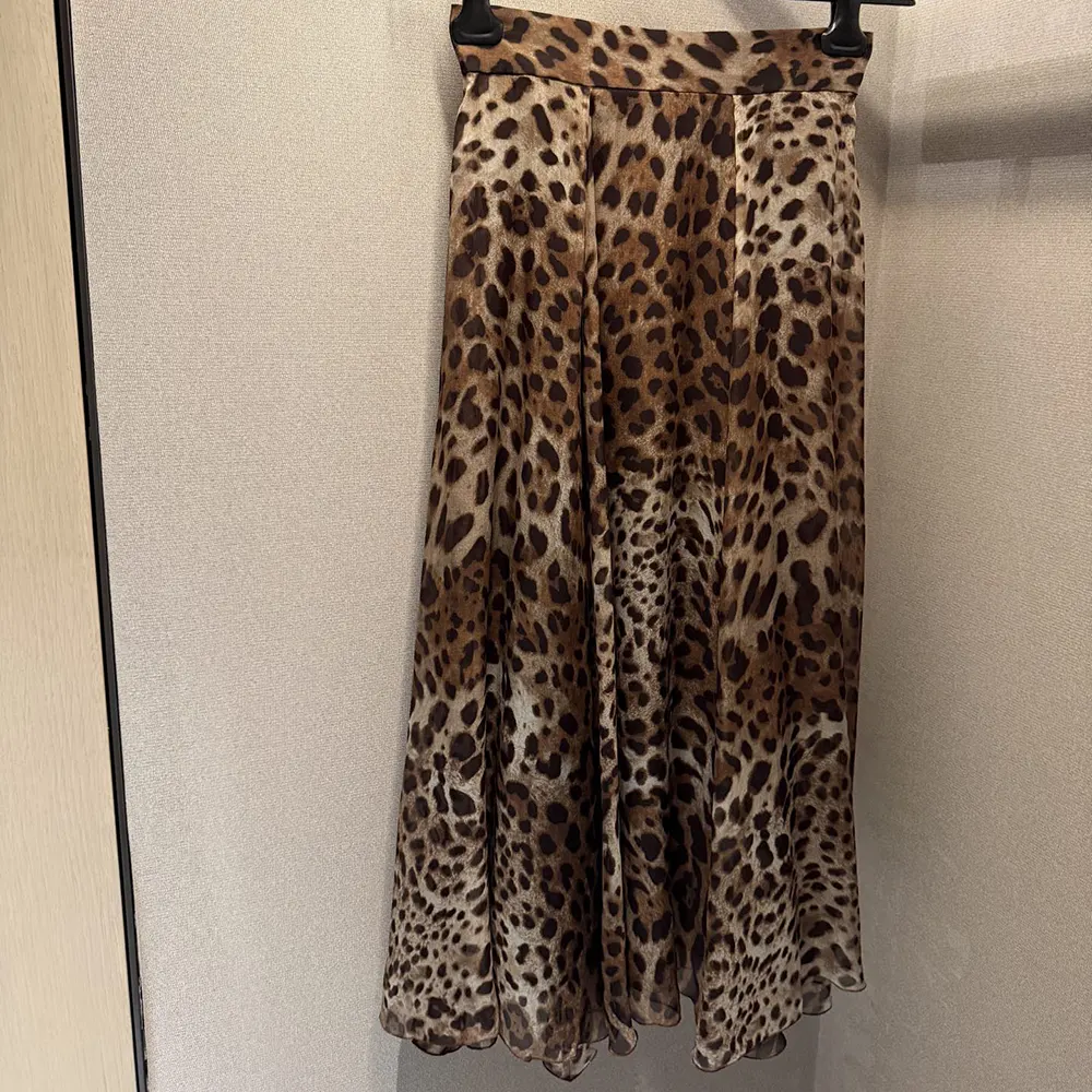 Side angle showing chiffon flow of Dolce Gabbana D&G Leopard-Print Circle Skirt