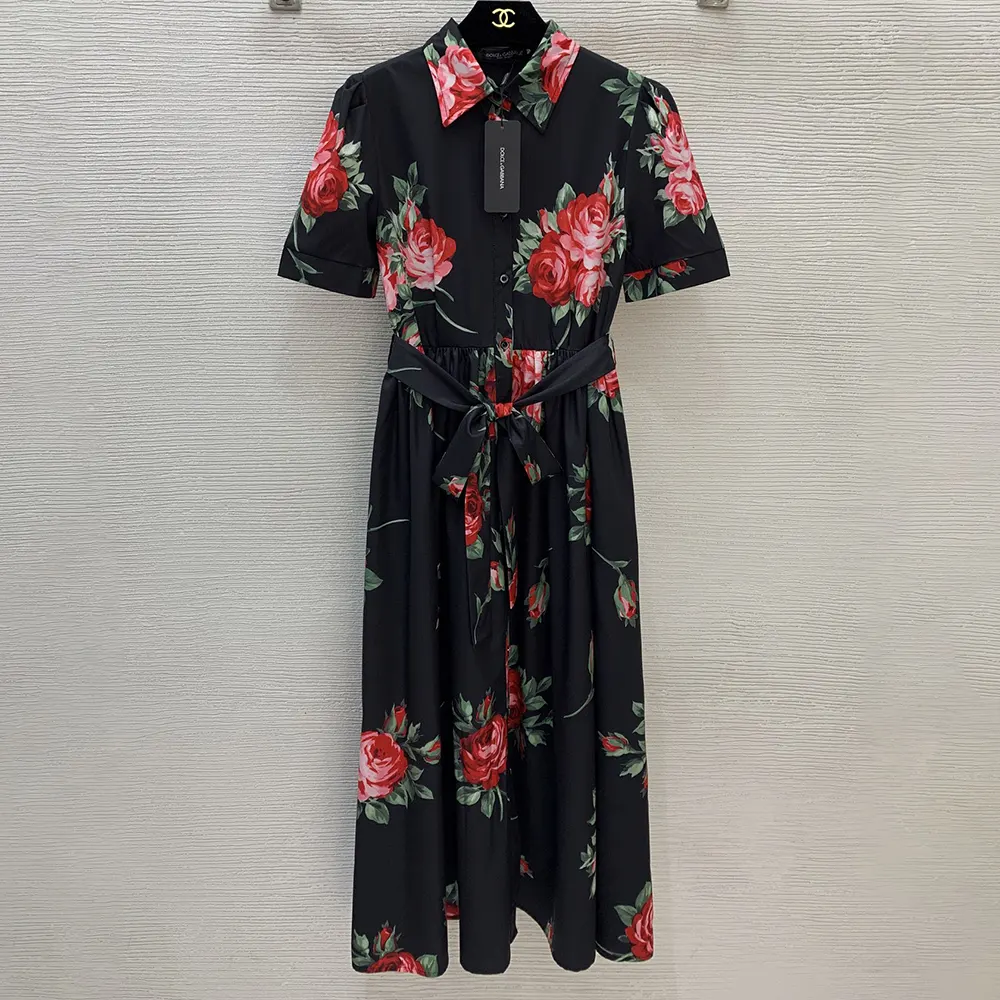 Close-up of rose bouquet print on Dolce Gabbana D&G shirt dress fabric