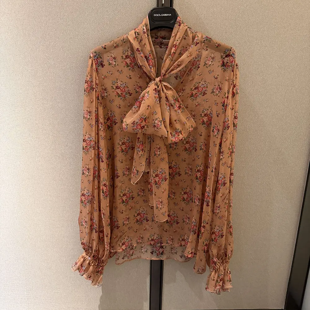 Close-up of floral print detail on Dolce Gabbana D&G chiffon top