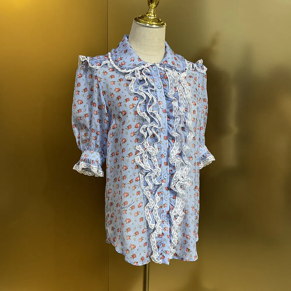 Close-up on rose print detail on Dolce Gabbana D&G chiffon shirt