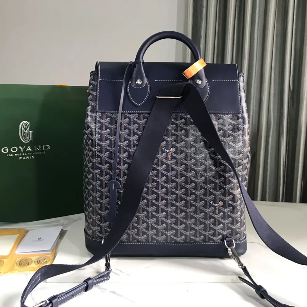 Side profile of Goyard Unisex Alpin MM Backpack-Navy with adjustable straps