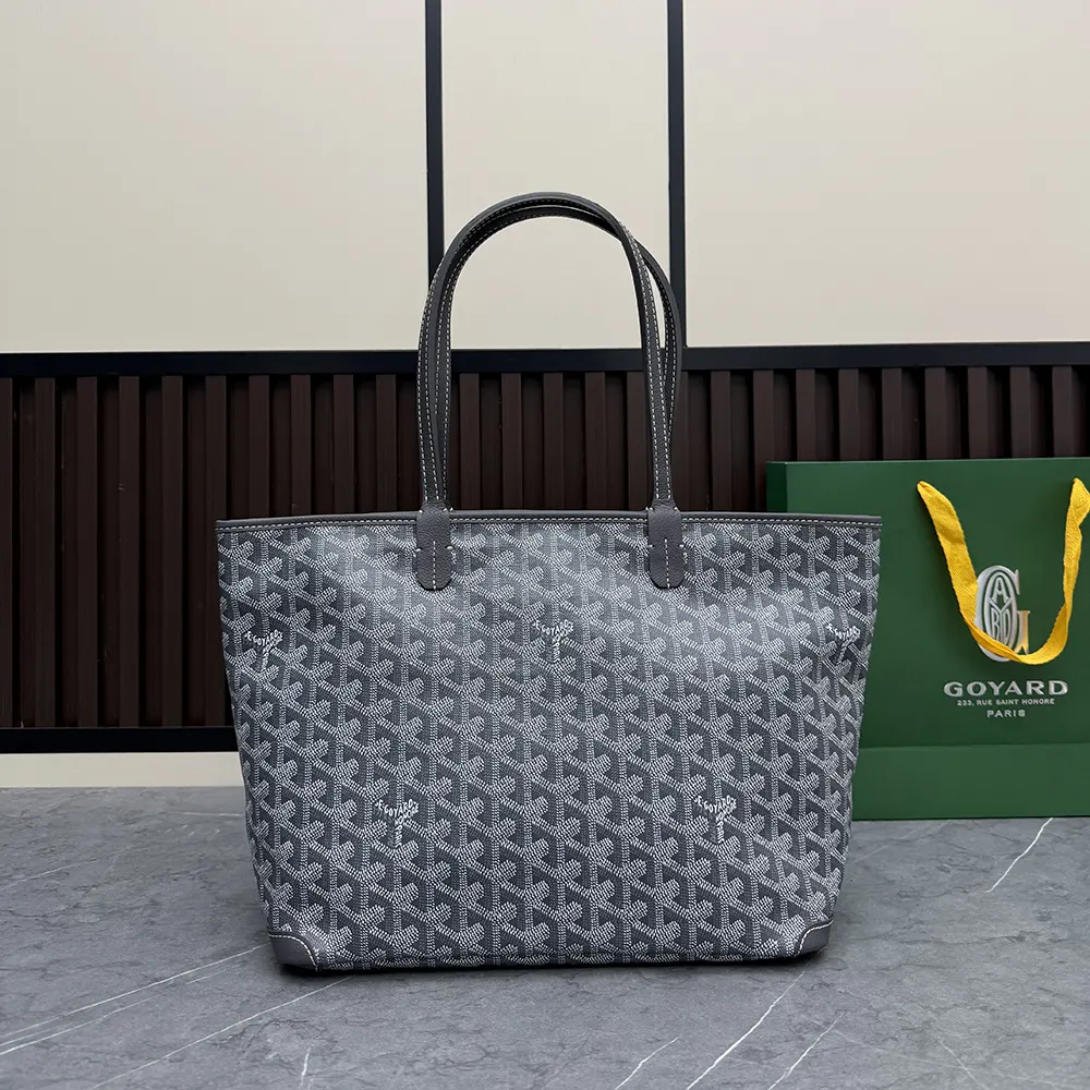 Side profile of Goyard Unisex Artois Pm Bag-Grey with strap visible