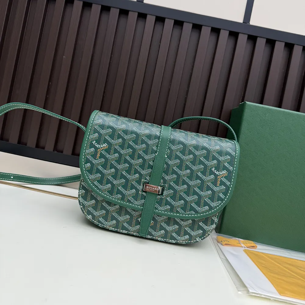 Close-up of green Goyard Unisex Belvedere Mm Bag canvas and brass hardware
