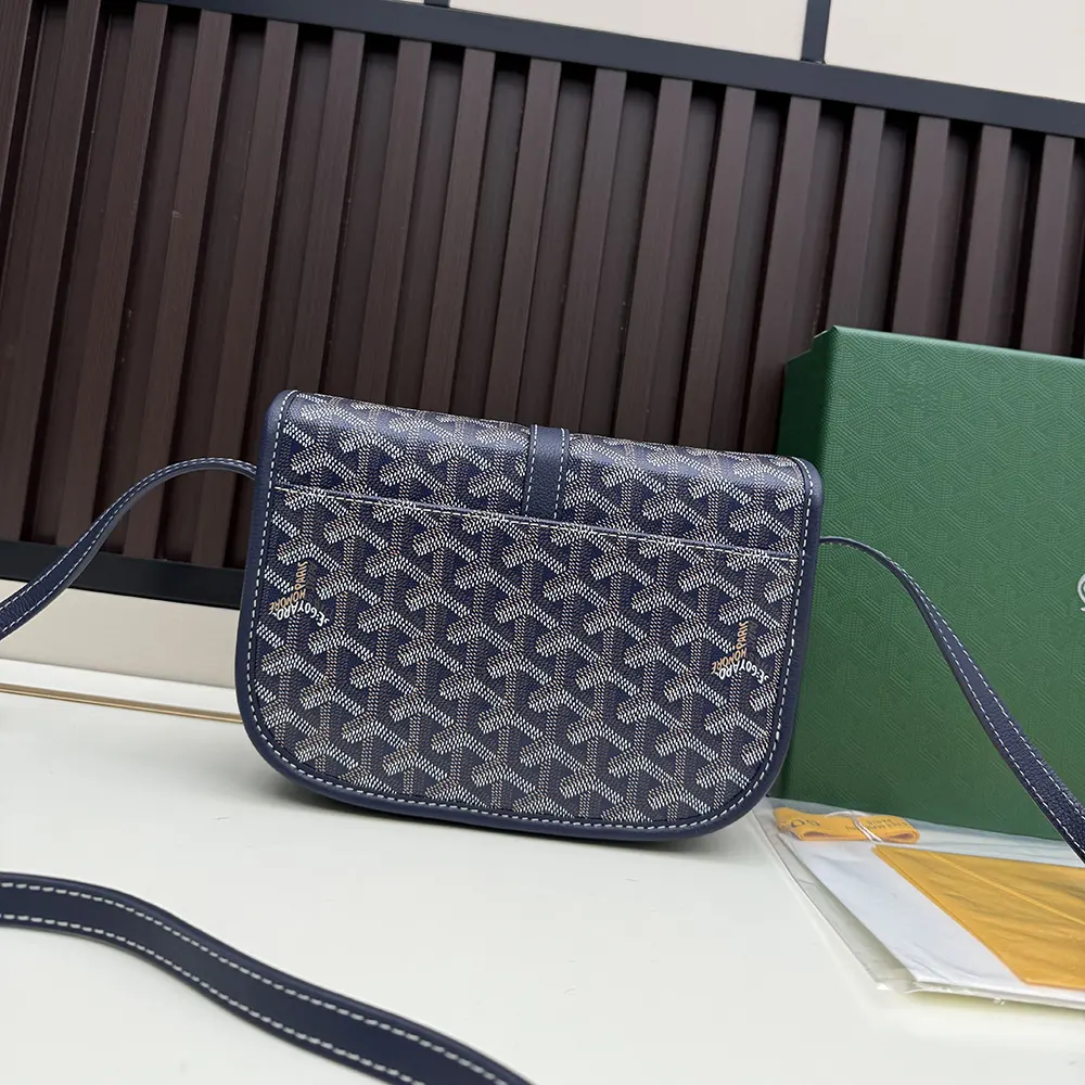 Side angle of Goyard Unisex Belvedere Mm Bag-Navy highlighting structured silhouette