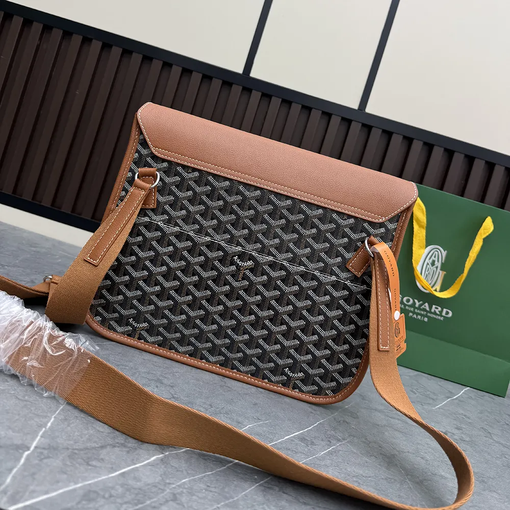 Side profile showing adjustable strap on Goyard Unisex Coursier Messenger Bag-Tan