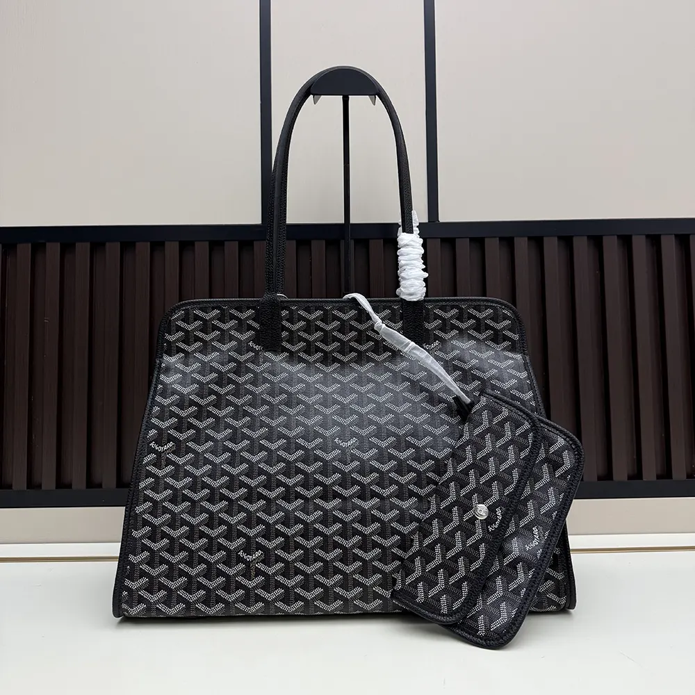 Side angle of Goyard Unisex Hardy Pm Bag-Black with shoulder strap
