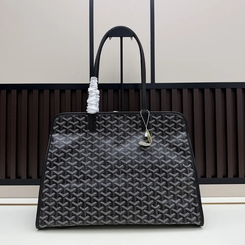 Close-up detail of coated canvas and silver hardware on Hardy Pm Bag