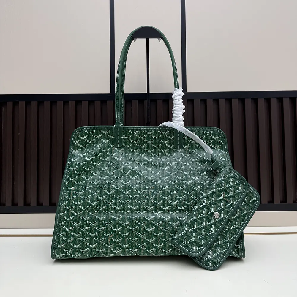 Close-up detail of green coated canvas and gold hardware on Hardy Pm Bag