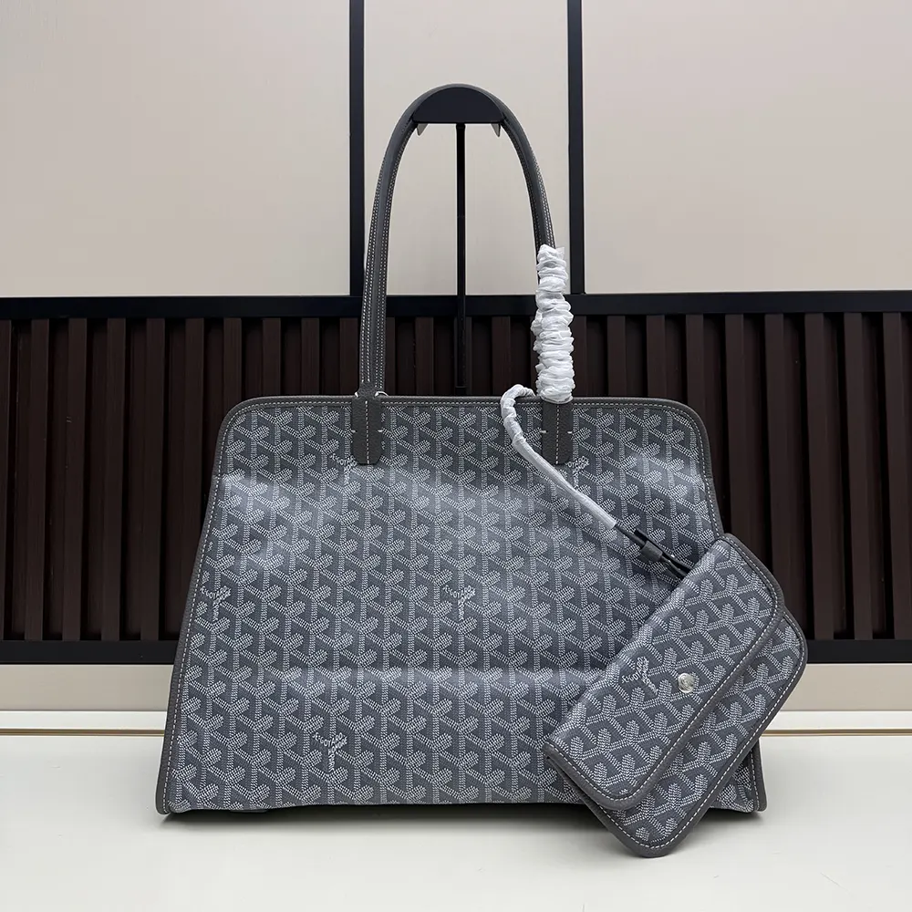Close-up of Goyard Hardy Pm Bag-Grey brass hardware and zipper detail