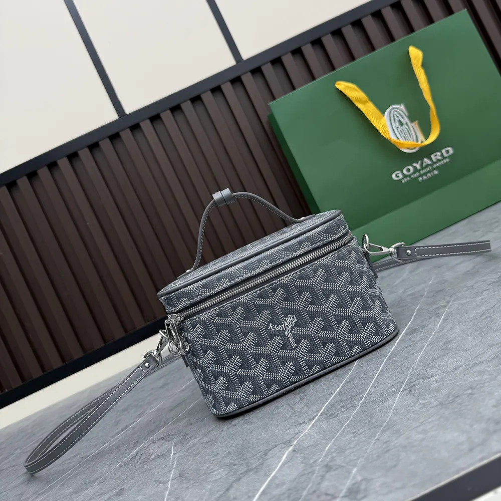 Close-up of polished silver hardware on Goyard Unisex Muse Mini Vanity-Grey