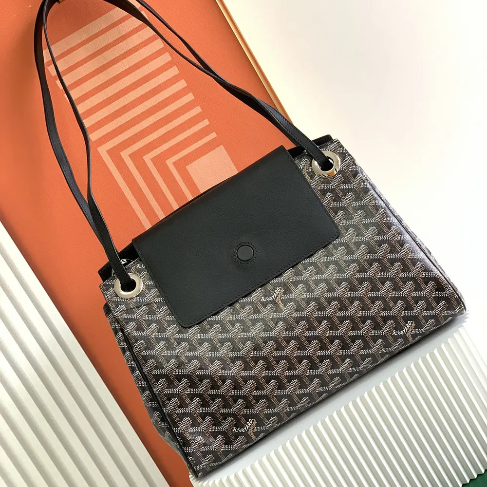 Close-up of Goyard Unisex Rouette Souple Bag-Black leather trim detail