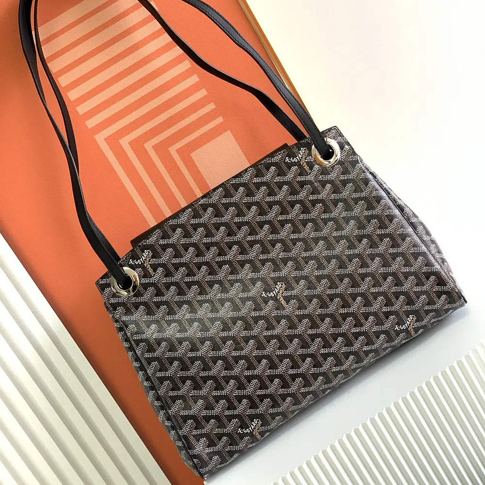 Side view of Goyard Unisex Rouette Souple Bag-Black with strap visible