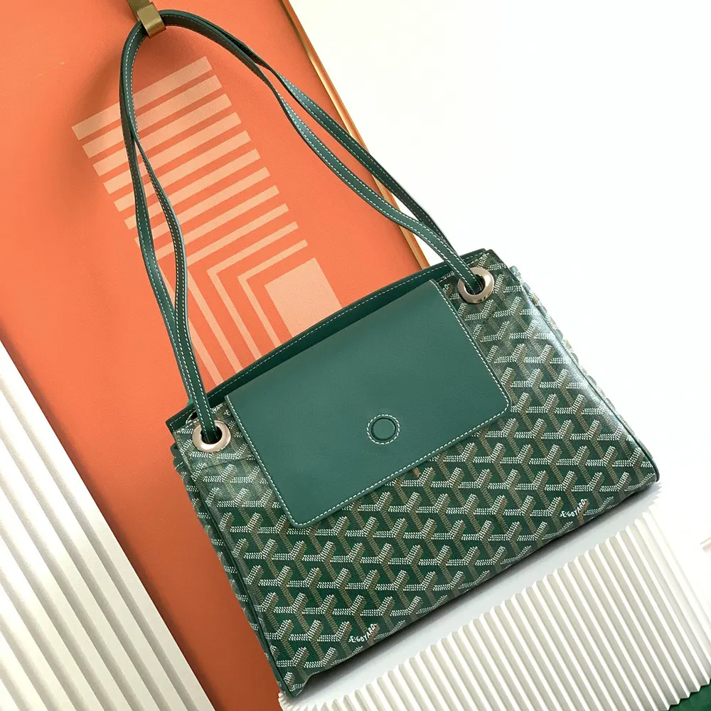 Close-up of brass hardware and hand-painted details on Goyard Rouette Souple Bag-Green