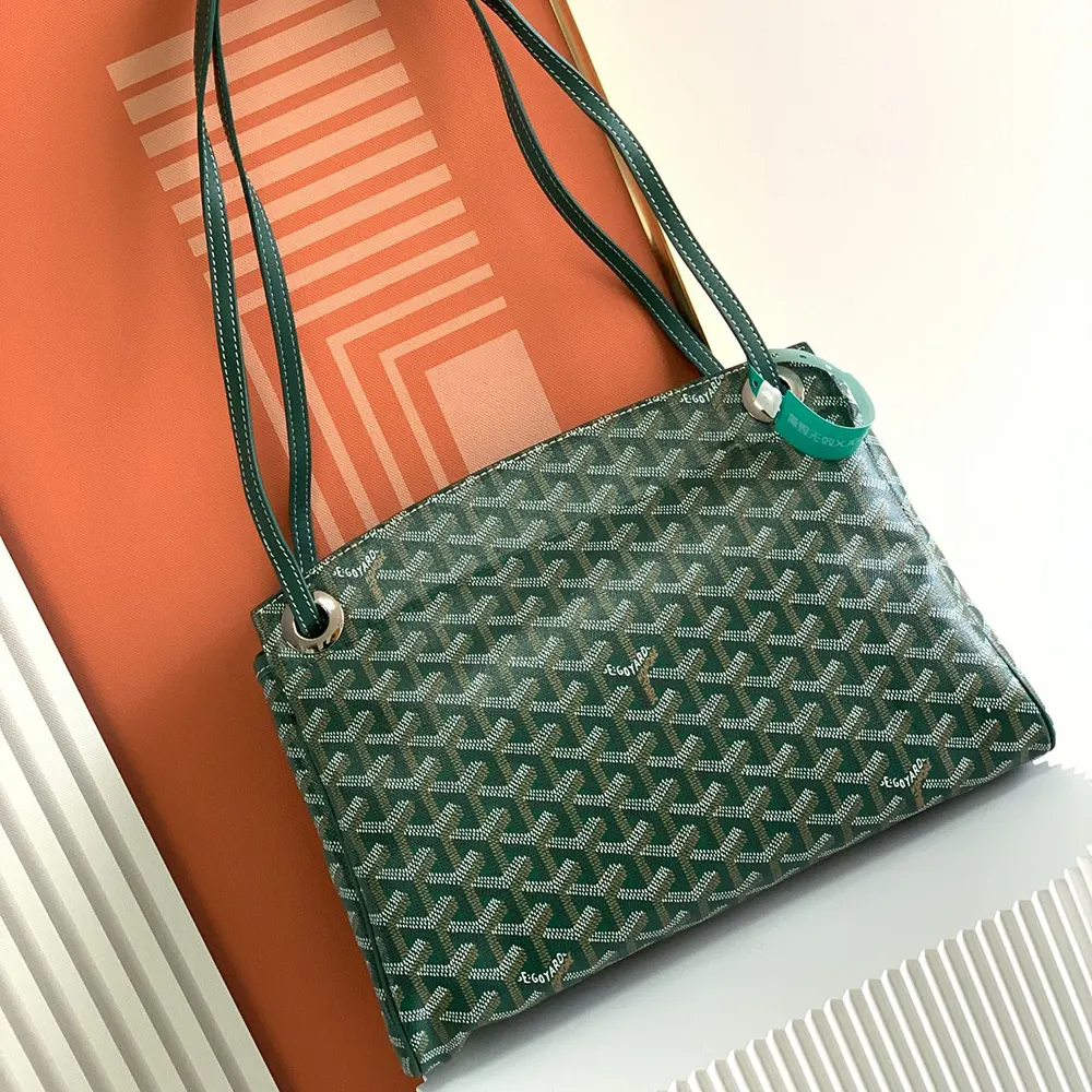 Side angle highlighting supple silhouette of Goyard Unisex Rouette Souple Bag-Green