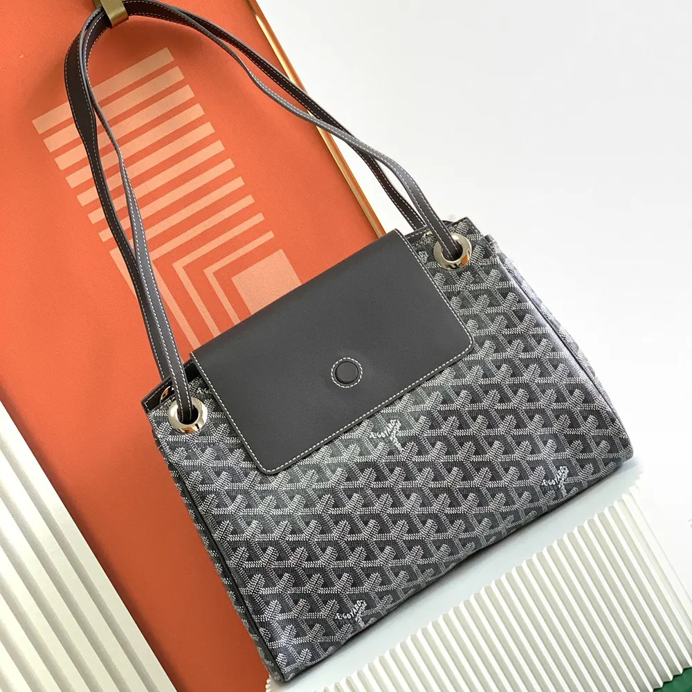 Close-up of grey coated canvas and matte black hardware details