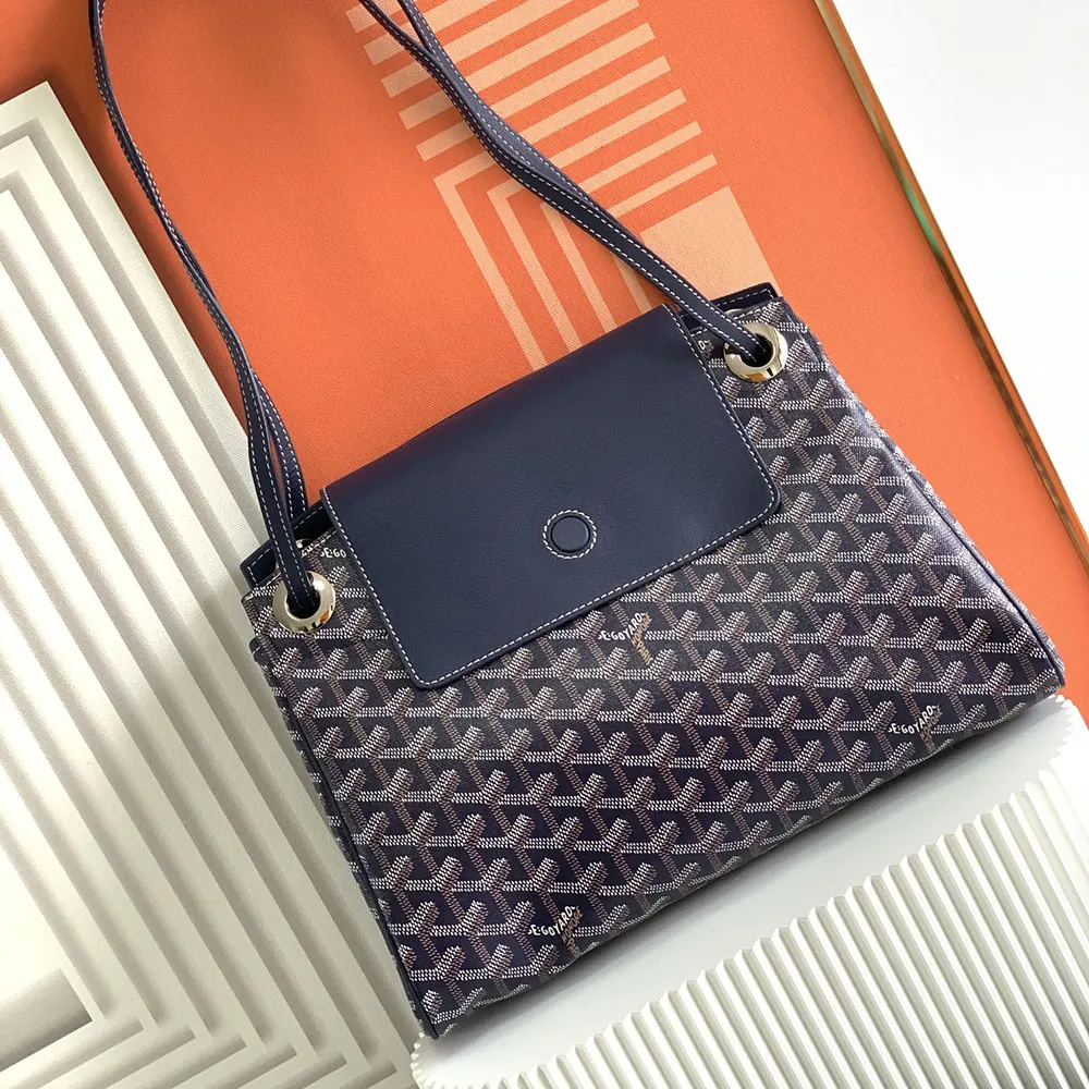 Close-up of zip and gold hardware on Goyard Unisex Rouette Souple Bag-Navy