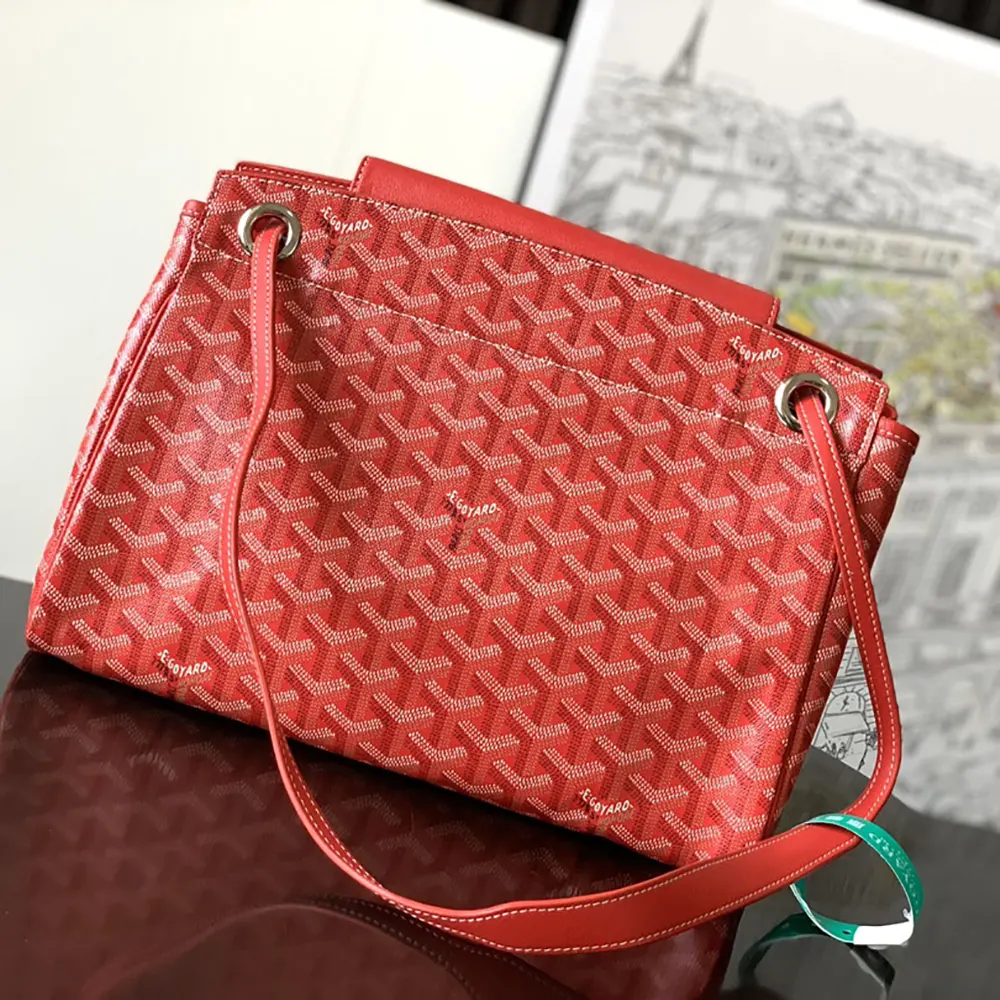 Side angle showing soft silhouette of Goyard Unisex Rouette Souple Bag-Red