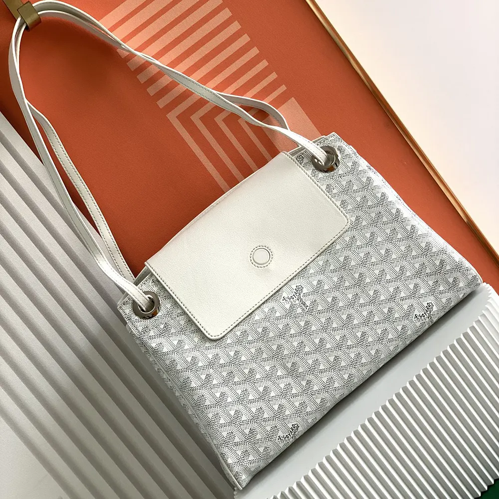 Close-up of white Goyard Unisex Rouette Souple Bag hardware and texture