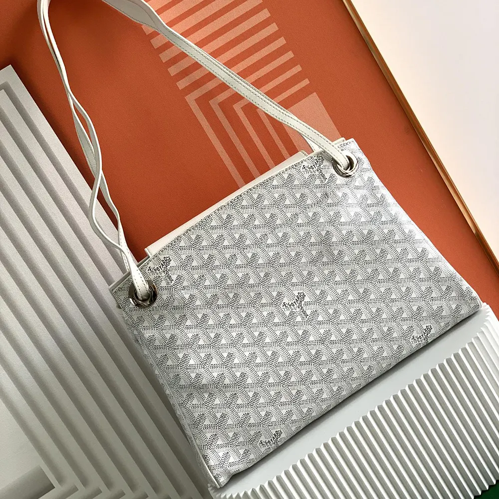 Side angle showing silhouette of Goyard Unisex Rouette Souple Bag-White