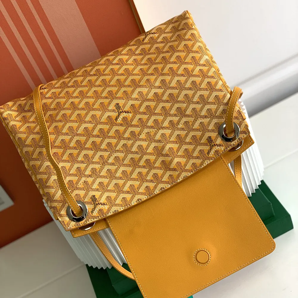 Side angle of Goyard Unisex Rouette Souple Bag-Yellow with adjustable shoulder strap
