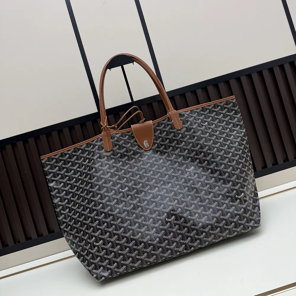 Side profile of Goyard Unisex Saint Louis Gm Bag-Tan with shoulder strap