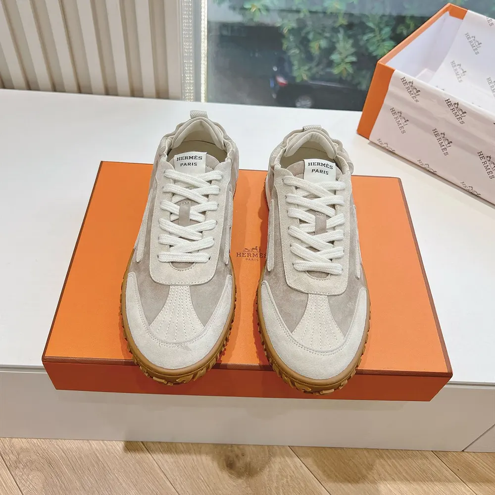 Top view showing lace-up closure of Hermes Unisex Jet Sneaker